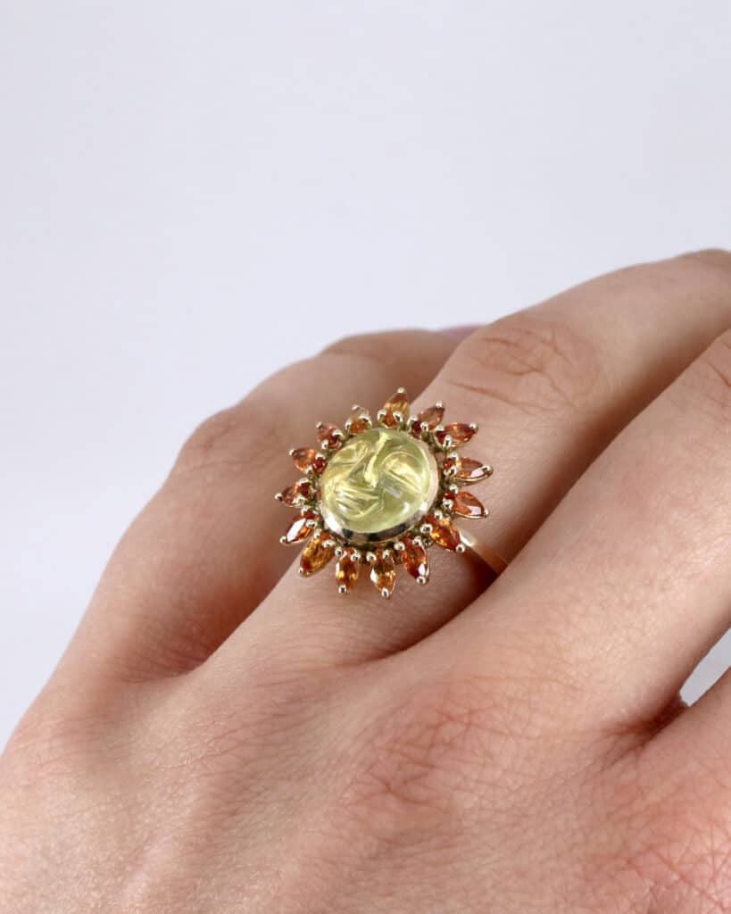 ‘Sol Ring’ yellow gold, carved lemon quartz with orange sapphire sun rays